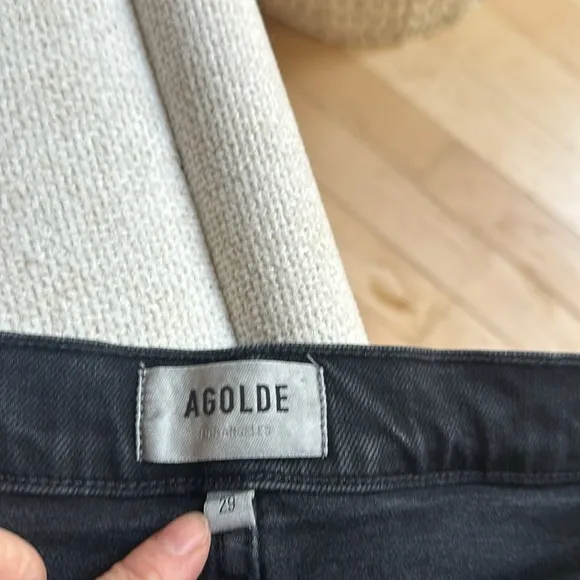 Black knee length button fly Agolde Jean stretch shorts. Size 29.