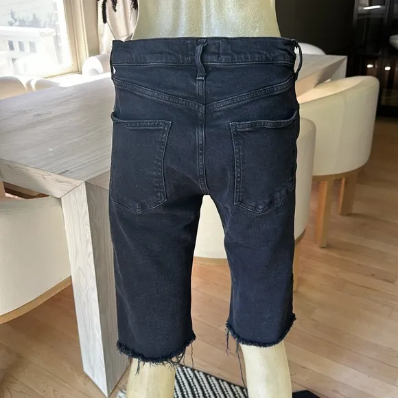 Black knee length button fly Agolde Jean stretch shorts. Size 29.